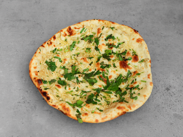 TAJ MAHAL LA ROCHE Naan à l’ail — TAJ MAHAL à La Roche-sur-Yon